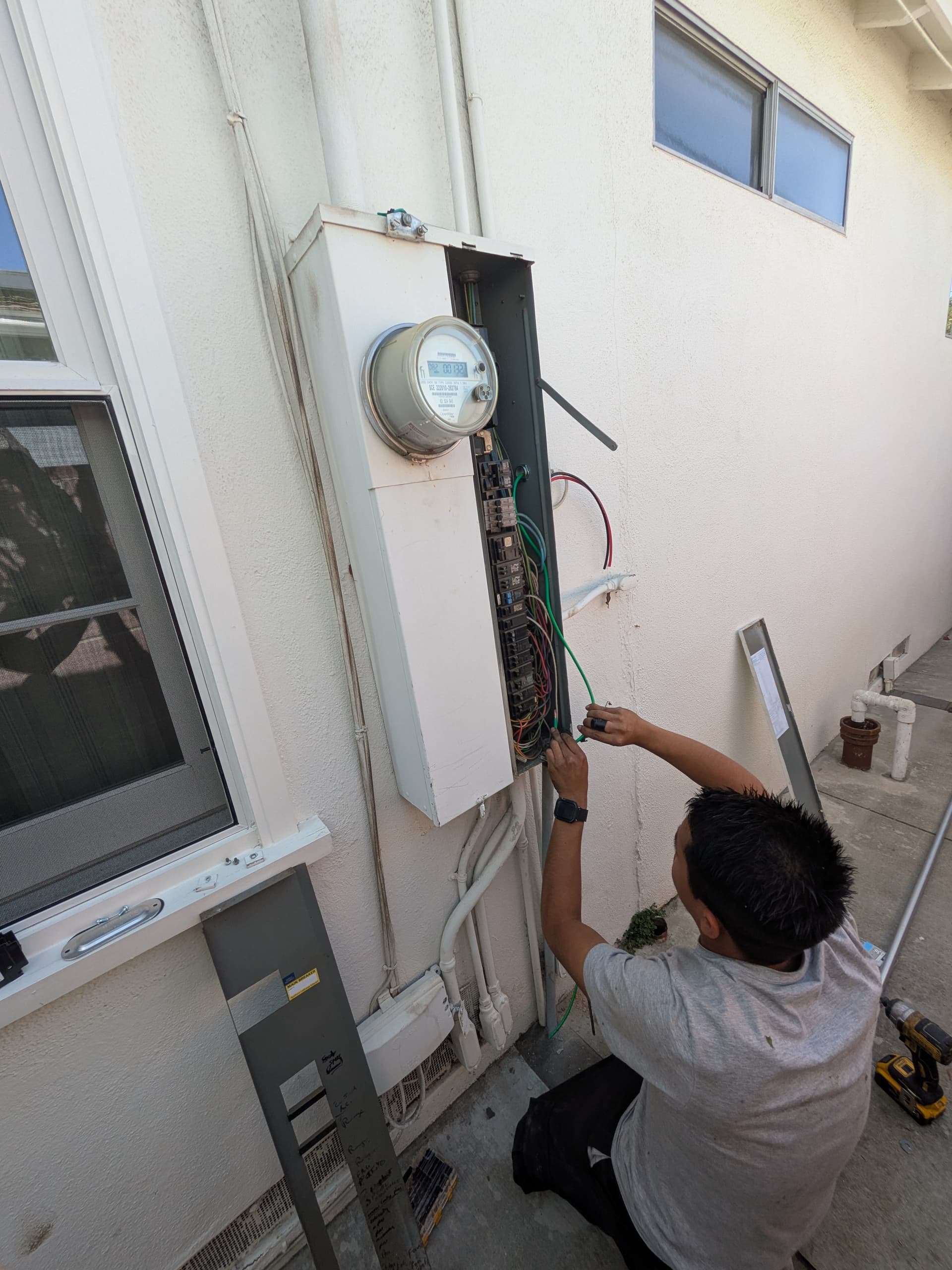 Old breaker panel in Pasadena home before 200-amp upgrade by RnR Electrician