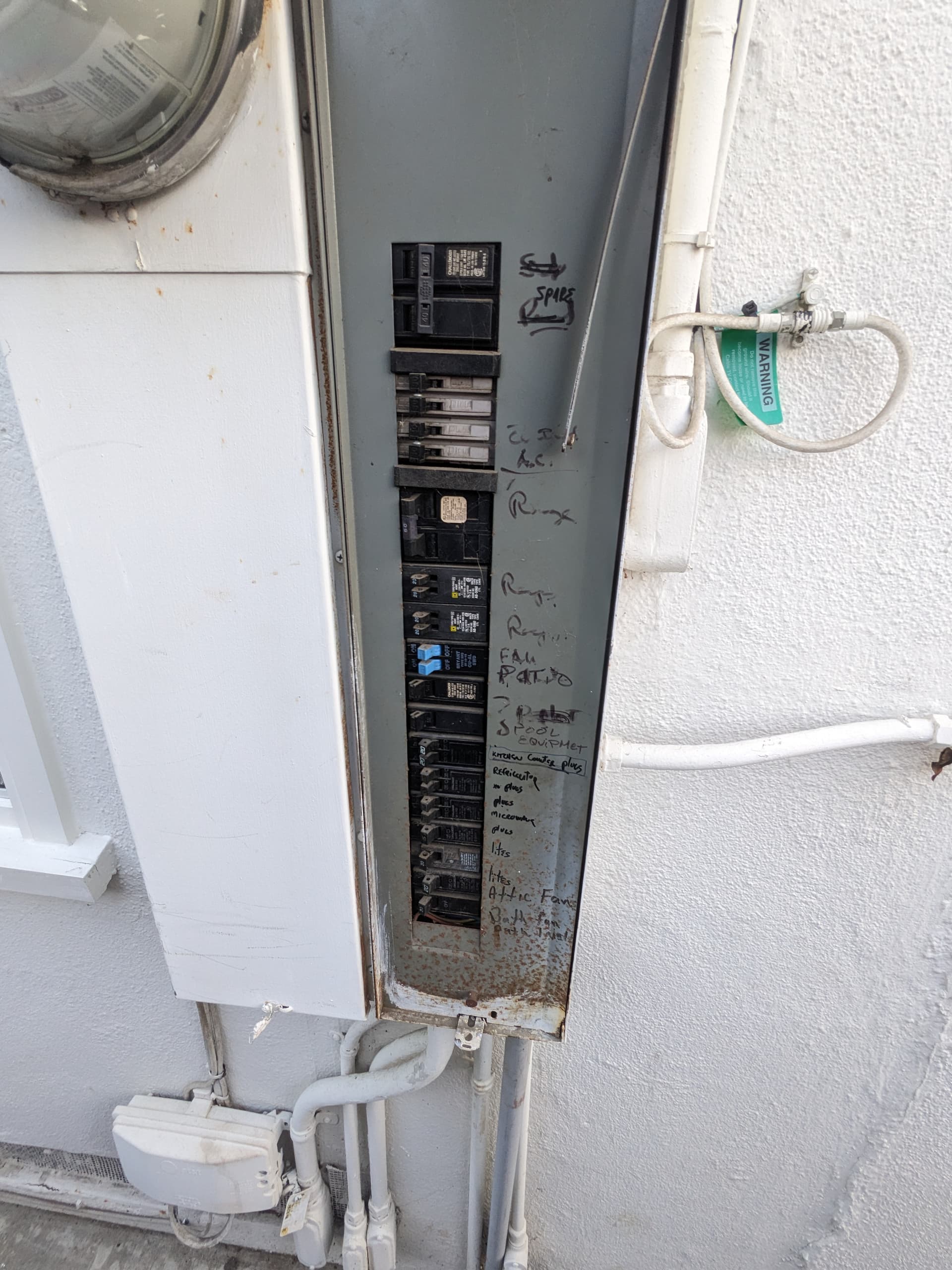 Old breaker panel in Pasadena home before 200-amp upgrade by RnR Electrician