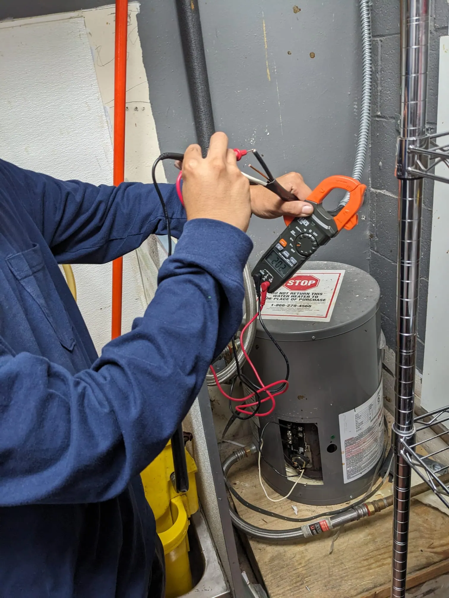 Electrician tracing circuit with no power during emergency electrical repair