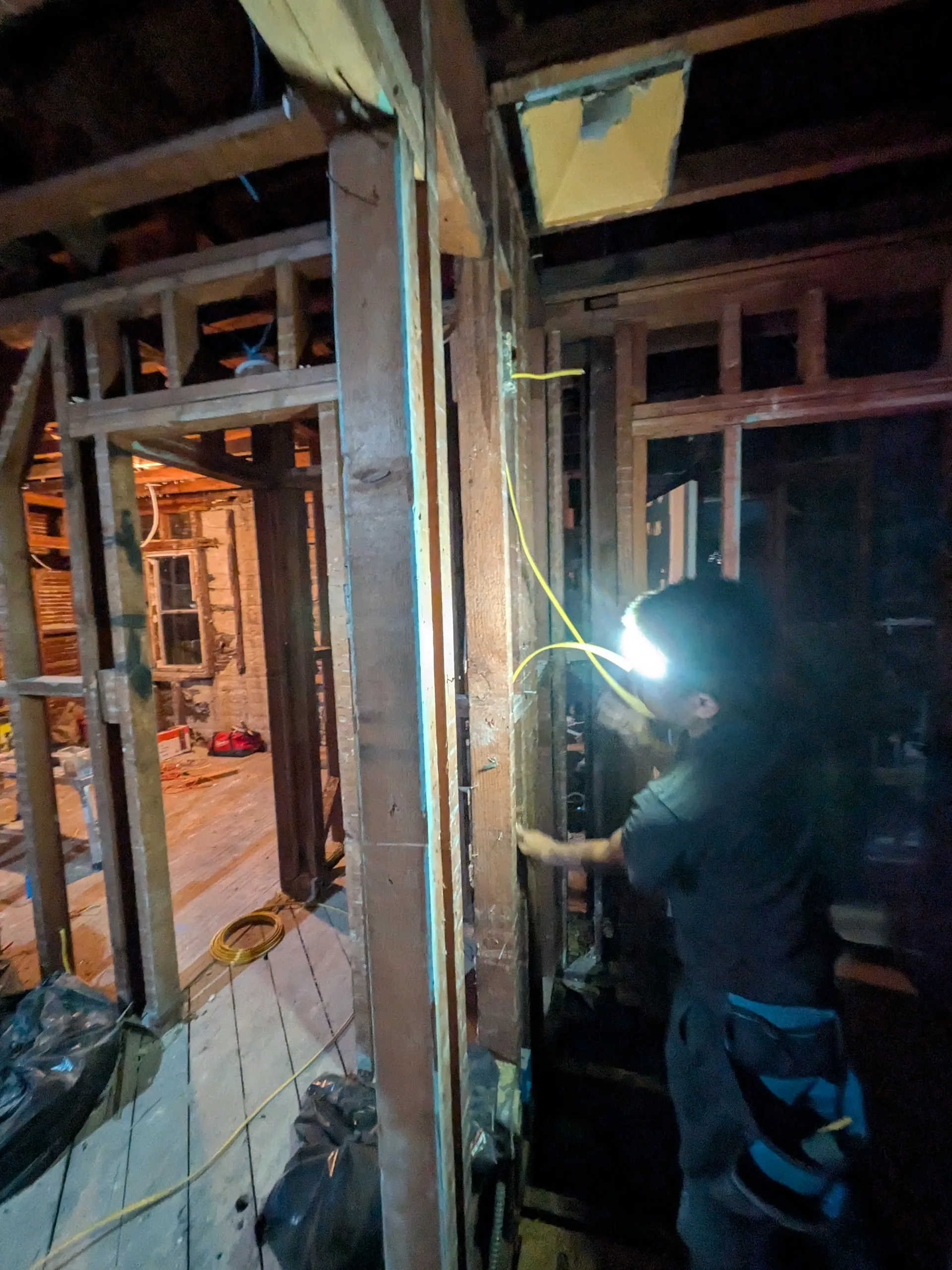 Electrical rewiring work in progress showing circuit installation