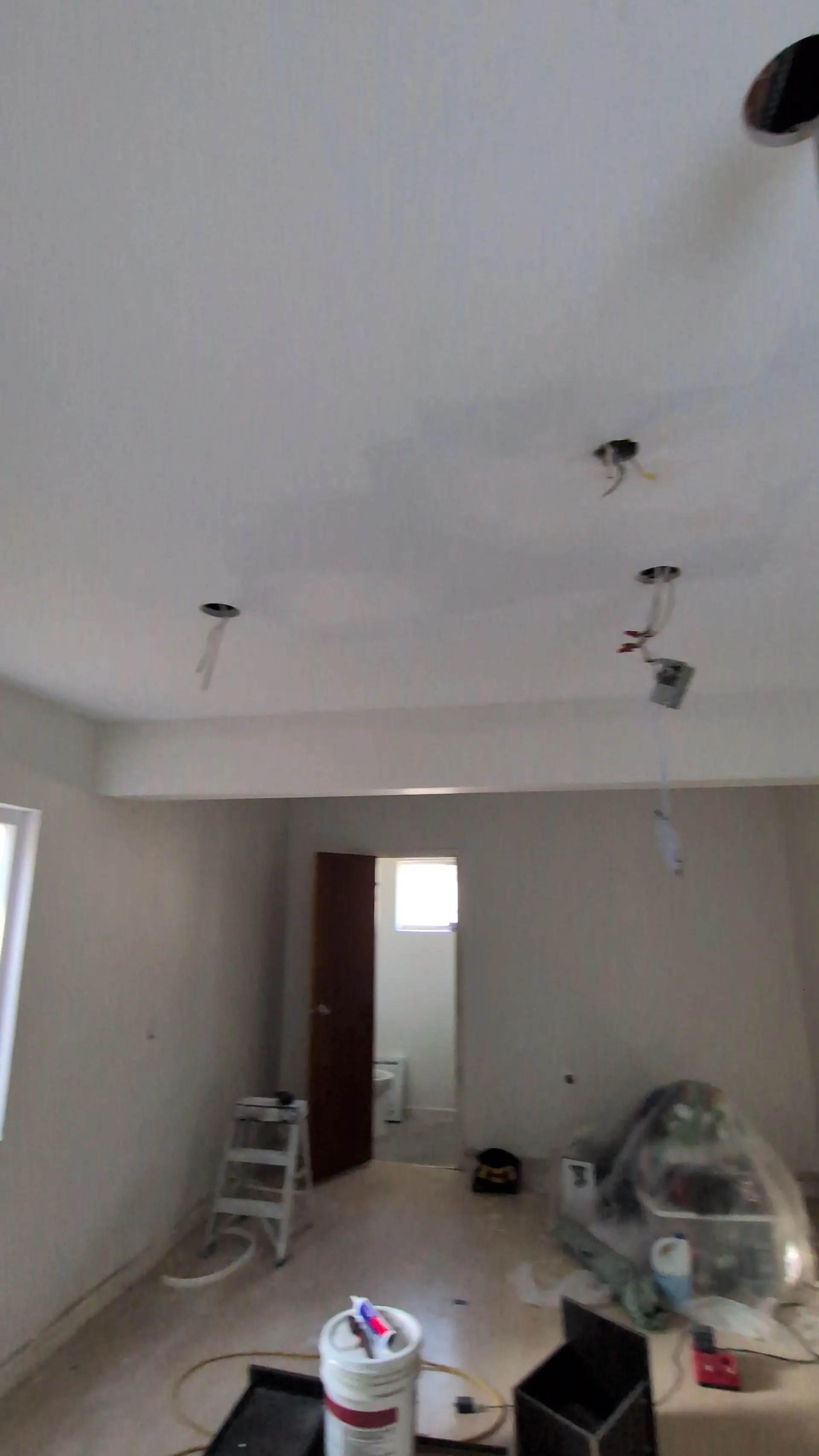 Clean rough-in holes drilled for LED strip light wiring