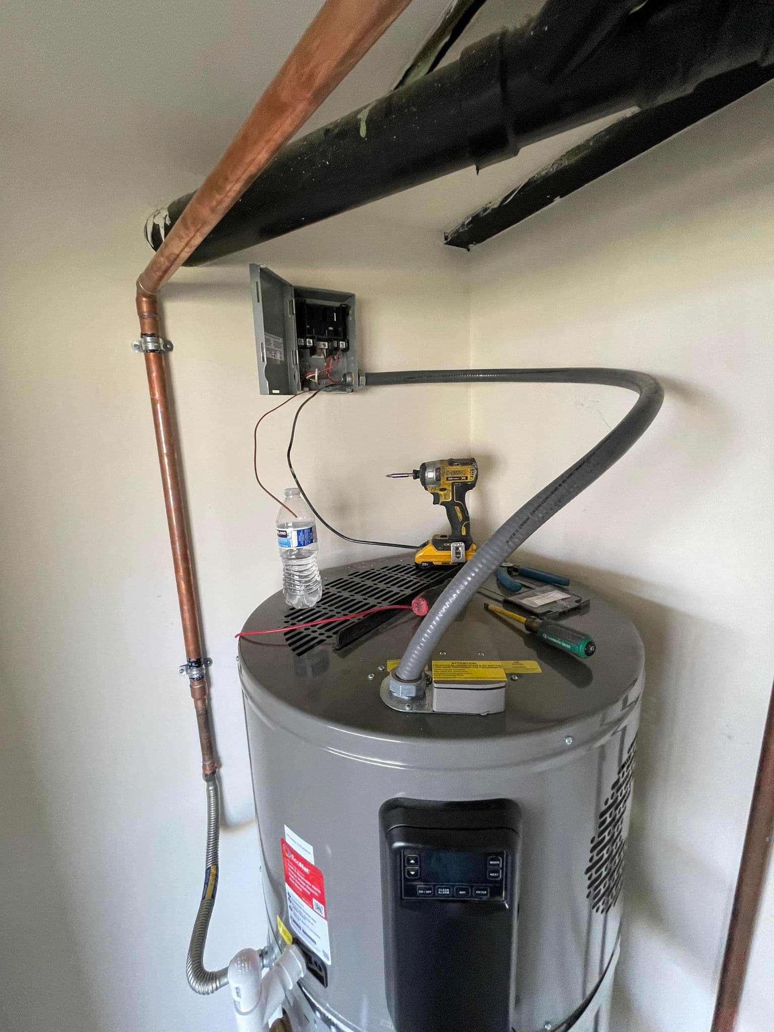 Electric water heater installed with dedicated 240V circuit by licensed electrician